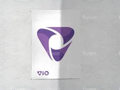 a purple and white logo is hanging on the side of a gray wall with a shadow