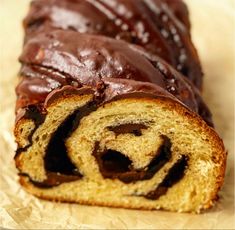 there is a chocolate swirl bread on the table