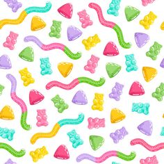 colorful candy candies with different shapes and sizes on a white background stock photo - 549