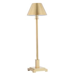 a gold floor lamp with a white shade