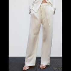 Flowy High Waist Pants With Adjustable Elastic Drawstring Waistband. Side Pockets And Wife Legs. Color Ecru Size Xlarge 100% Viscose New With Tag Bundle And Save Chic Summer Sleep Bottoms, White Spring Sleepwear With Elastic Waistband, White Relaxed Fit Wide Leg Pants For Loungewear, Casual White Sleep Pants, White Pants For Sleep In Spring, White Spring Sleep Pants, Zara Wide Leg Pants For Summer Loungewear, Zara Summer Wide Leg Pants For Loungewear, White Wide Leg Pants For Loungewear