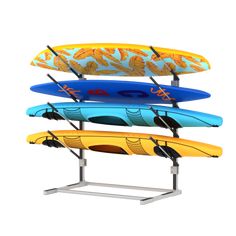 three surfboards are stacked on top of each other