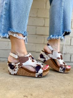 These Cattle Time Wedges are out of this world! With a comfortable 3" heel, your feet will thank you as you dance the night away. Stand out in Brown and White Cowprint with a playful, stylish heel strap. The nail head accents add a touch of quirkiness to your shoe game. True to size Silver Heel, Stylish Heels, Nail Head, Out Of This World, Cow Print, Shoe Game, Strap Heels, This World, White Silver