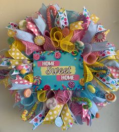 a colorful wreath that says home sweet home