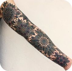 a person with a tattoo on their arm