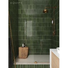 a green tiled bathroom with a wooden standup shower