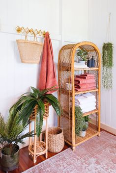 the instagram page on instagram shows an image of a shelf with towels and plants