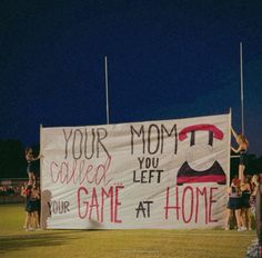 a banner that says your mom called you left your game at home on the field