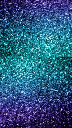 an abstract background with blue, green and purple speckles in the center on a black background