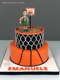 a cake made to look like a basketball player on top of a basket and net