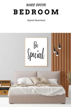 a bed room with a poster on the wall above it that says be special in black and white