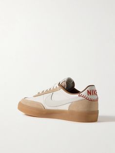 Find NIKE Killshot 2 Suede-trimmed Embroidered Leather Sneakers on Editorialist. Nike's 'Killshot' sneakers debuted in 1979 as an on-court performance style. Inspired by the original, this '2' version is made from leather and has suede accents and signature 'Swooshes'. Gum rubber soles and embroidered monikers at the heel tabs add to the old-school feel. Gucci Eyewear, Embroidered Shoes, Embroidered Leather, Brown Sneakers, Suede Sneakers, Pump Sandals, Sunglasses Shop, Manolo Blahnik, Net A Porter