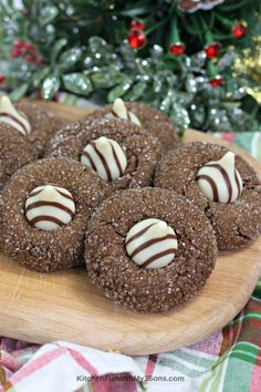 cookies with white chocolate and candy on a wooden platter