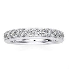 a white gold wedding band with princess cut diamonds