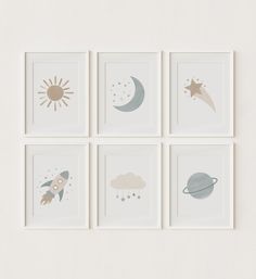 four framed pictures with different shapes and designs on them, each featuring an image of a rocket