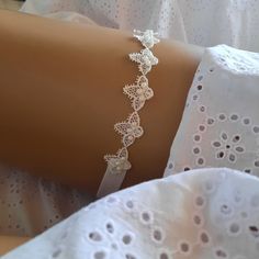 Affordable garter Plus size bridal garter set Plus size Garter belt  Made with cotton lace velastic Beads handcrafted A simple and very stylish accessory. Nice gift for bridesmaids Used mannequin thighs 18inches Never slip On model on request Change (bead color or flexible bench) is made If you contact me i will help you with everything Thank you very much in advance Best regards: Vijdan  :) Fitted Lace Trim Bridal Accessories For Bride, Adjustable Lace Bridal Accessories For Ceremony, Fitted Lace Bridal Belt For Bride, White Bridal Belt For Bride, White Fitted Bridal Belt For Ceremony, Adjustable Bridal Belt For Wedding, Fitted Lace Bridal Accessories For Bride, Adjustable Lace Bridal Accessories For Wedding, Elegant Lace Bridal Accessories For Wedding