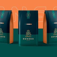 three bags of coffee sitting next to each other on a green and orange background with the words sense