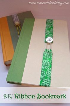 an open book with a green and white ribbon on it, next to another book that reads diy ribbon bookmark