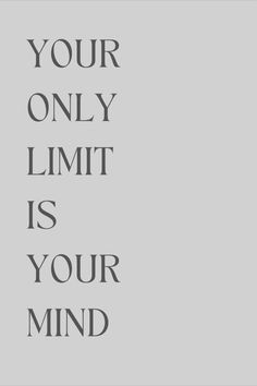 the words your only limit is your mind on a gray background with black and white lettering