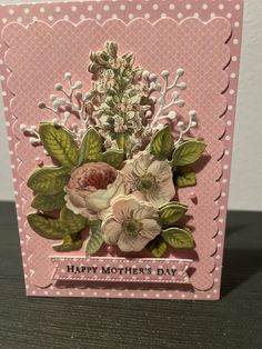 a mothers day card with flowers on it