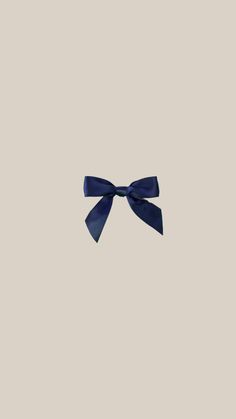 a blue bow on a gray background