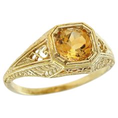 Add a delicate and unique aesthetic to your hand with this filigree ring by GEMMA FILIGREE. Our antique design gold filigree rings equate to delicacy and light openwork, while maintains strength for everyday wear for a lifetime. This striking filigree design ring with floral and leaf motif is a symbol of growth and femininity, encompassing a beautiful meaning for the wearer. CHARACTERISTICS Status: Made to order Origin: Thailand Metal: Solid 9K Yellow Gold Ring Size: US 3-8 Total Gemstones Weigh Antique Rings Gold 1stdibs, Luxury Yellow Gold Filigree Ring With Intricate Design, Vintage Jewelry Rings 1stdibs, Citrine Engagement Ring Vintage, Topaz Engagement Ring Yellow, Yellow Stone Engagement Ring, Filigree Rings, Symbol Of Growth, Citrine Ring Engagement