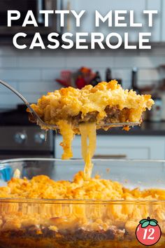 a spoon full of macaroni and cheese being lifted from the casserole dish