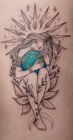 a woman sitting on top of a plant with the earth in her lap