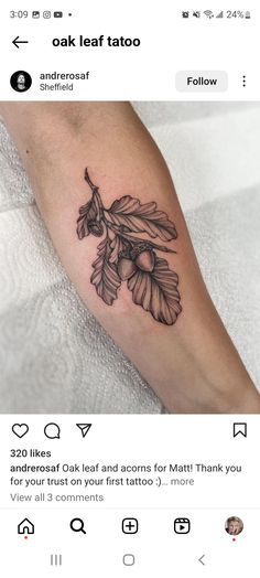 a tattoo on the leg of a person with flowers and leaves tattooed on their arm