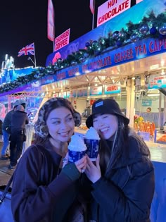 Two Asian girls best friends spending Christmas in winter wonderland holding a hot chocolate and smiling London Christmas Instagram, Winter Photos Friends, Winter Wonderland London Outfit, Winterwonderland London Outfit, Christmas Market Instagram Pictures, London Best Friends, London Instagram Pictures Winter, Winter Wonderland Aesthetic London