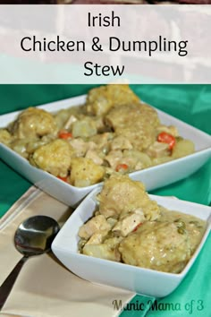 two white bowls filled with chicken and dumpling stew on top of a green table cloth