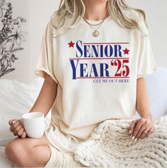 Senior 2025 Shirt, Gift for Senior, 2025 Graduation Gift, High School Tee, Class of 2025 Senior Shirt, College Matching Shirt  Heather colors are 52% combed and ring-spun cotton, 48% polyester - Athletic and Black Heather are 90% combed and ring-spun cotton, 10% polyester - Solid Colors 100% pre-shrunk cotton - Fiber content may vary by color FOR THE BEST FIT; (See Size Chart in Images). 1) Lay a t-shirt on a flat surface. 2) Measure the chest area, just under the armpit from side to side find t 23niors Shirt, Class Shirt Design Ideas High Schools, Class Of 25 Senior Shirts, Senior T Shirts Ideas Design 2025, Senior Class Shirts Design, Class Shirt Ideas, Senior T Shirts Ideas Design, Senior Shirt Designs, Senior Shirt Ideas