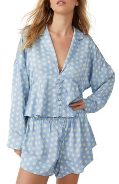 Smooth satin pajamas speak for themselves with a dropped-shoulder fit and comfy button-fly shorts. 19 1/2" front top length; 22" back top length; 3" inseam, 34" leg opening; 13" front rise; 16" back rise (size Medium) Top has front button closure; deep V-neck; notched collar; long sleeves Shorts have elastic waist; button fly 100% polyester Hand wash, line dry Imported Summer Sleepwear, Printed Pajama, Short Pajamas, Bodysuit Jumpsuit, Satin Shorts, Satin Long Sleeve, Beauty Sleep, Satin Pajamas, Little White Dresses