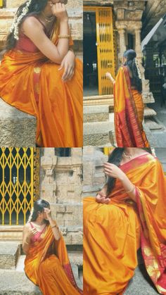 a woman sitting on the ground wearing an orange sari and holding her hand up to her face