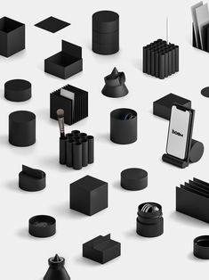 an assortment of black objects on a white background