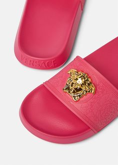 Rubber pool slides embellished with a three-dimensional Medusa plaque surrounded by a Greca accent. Pink Versace, Luxury Wishlist, Versace Slides, Pink Slides, Birthday Hairstyles, Rubber Sandals, Pool Slides, Shoe Game, Online Design