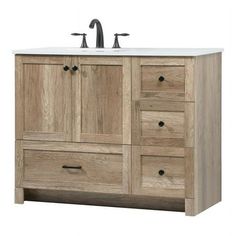 an image of a bathroom vanity with two faucets on the top and drawers