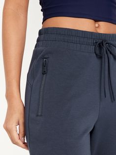 elastic-drawstring waist faux fly zippered hip pockets cuffed leg sits at belly button semi-fitted hip and thigh slim leg 27 1/2" regular inseam 25 1/2" petite inseam 30 1/2" tall inseam models are approx.  5'9" and wear sizes s (4), l (12), and xl (18)machine wash according to the care instruction label Sweats Outfits, Comfy Pants, Activewear Sets, Fleece Joggers, Jack Black, Slim Leg, Slim Legs, Petite Size, Belly Button