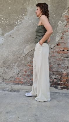 "This wide leg linen pants are perfect fit for the warm months of the year. The men style trousers has two side pockets and hook fly closer. On the back, there are two decorative pockets. ✥ Welcome to my world! I create my design in my dreams and I draw geometric lines and extravagant patterns with scissors, needles and thread. Be my dream catcher and let me create for you a parallel fashion world! ✥ SHIPPING Express shipping: 2-3 biz days via DHL Worldwide ✥ SIZING The model in the picture wear Khaki Wide Leg Cargo Pants, Casual Beige Full-length Dress Pants, Summer Khaki Straight Dress Pants, Khaki Straight Dress Pants For Summer, Casual Linen Dress Pants, Khaki Straight Cargo Pants, Flax Wide Leg Relaxed Fit Pants, Khaki Wide-leg Linen Pants, Khaki Wide-leg Pants