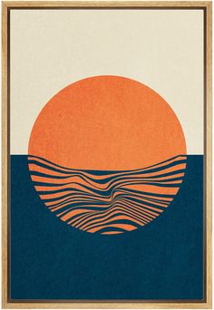 an orange and blue sunset over the ocean with waves on it's sides, framed in wood