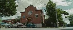 a police car parked in front of a church