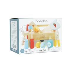 the wooden toy tool box is packed with different toys and tools to make it look like they're working on something