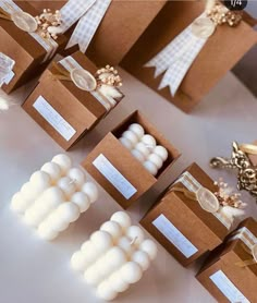 small boxes filled with marshmallows on top of a table