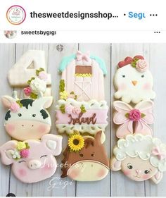 some decorated cookies with farm animals on them