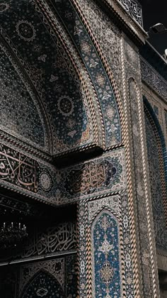 an intricately designed building with blue and white tiles