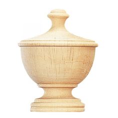 a wooden urn sitting on top of a white surface