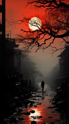 a person walking down a street at night with the sun setting in the sky behind them