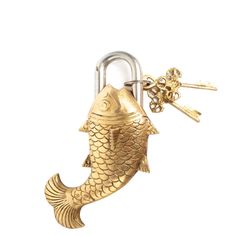 a gold fish keychain with keys attached to it's side and an open lock