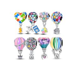 six colorful hot air balloons are shown in different styles and sizes, with the words happy on them