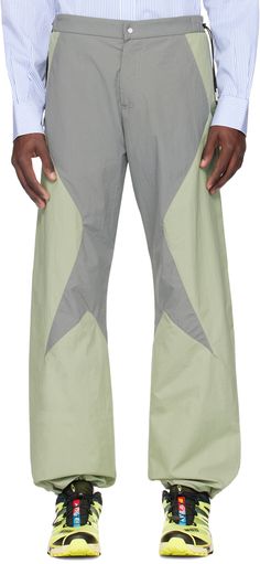 Lightweight nylon taffeta track pants. · Paneled construction · Drawstrings at waistband · Four-pocket styling · Zip-fly · Bungee-style drawstring at cuffs Supplier color: Grey/Green Summer 2025, Fleece Pants, Grey Green, Gray Green, Mens Summer, Track Pants, Green And Grey, Apparel Accessories, Top Brands